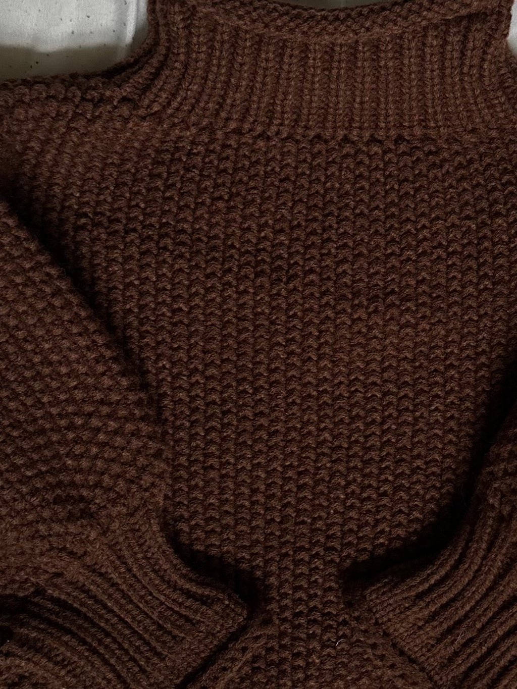 Dark brown thick, cotton polyester blend turtleneck. 