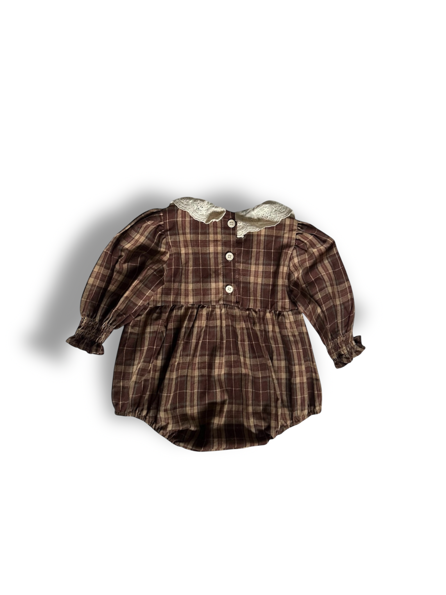 Back of 100% cotton Brownish plaid bubble romper with lace front and collar, buttons in back. 