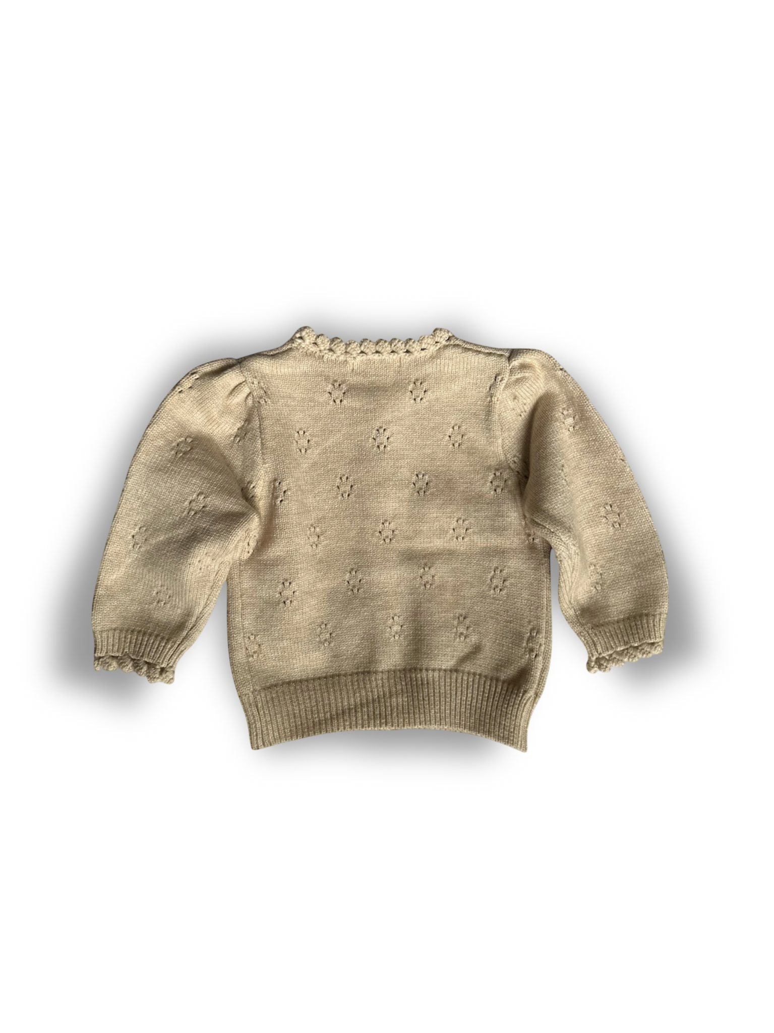 Apricot tan soft and thick polyester blend cardigan with buttons, pointelle design. 