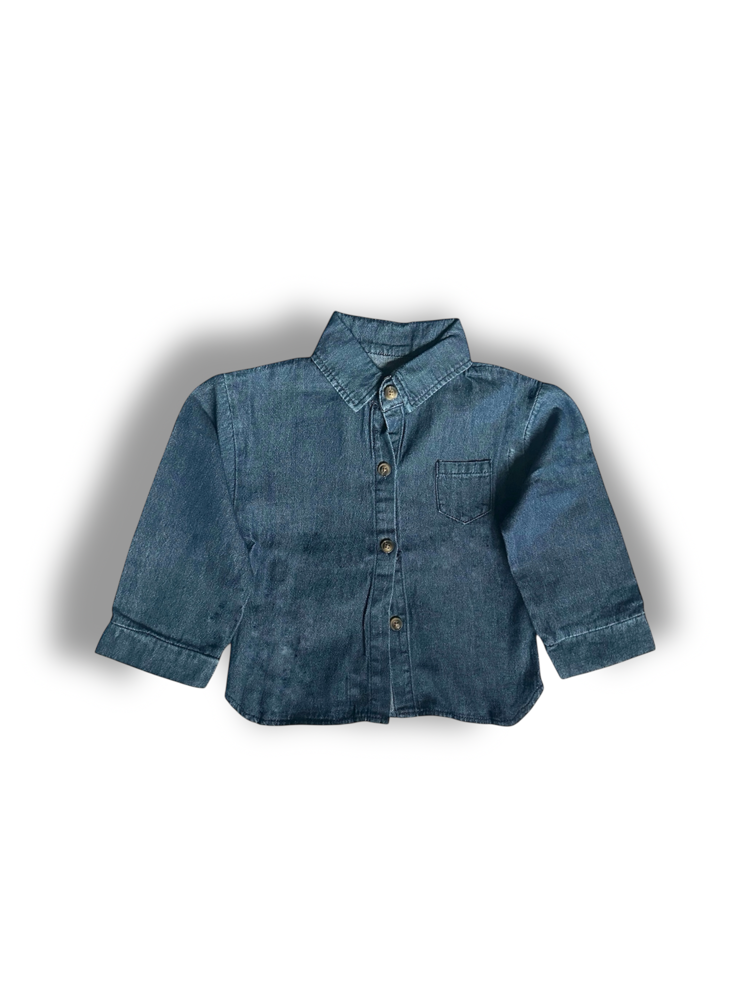 Light to medium wash denim shirt, long sleeve, collar, buttons, 100% cotton.