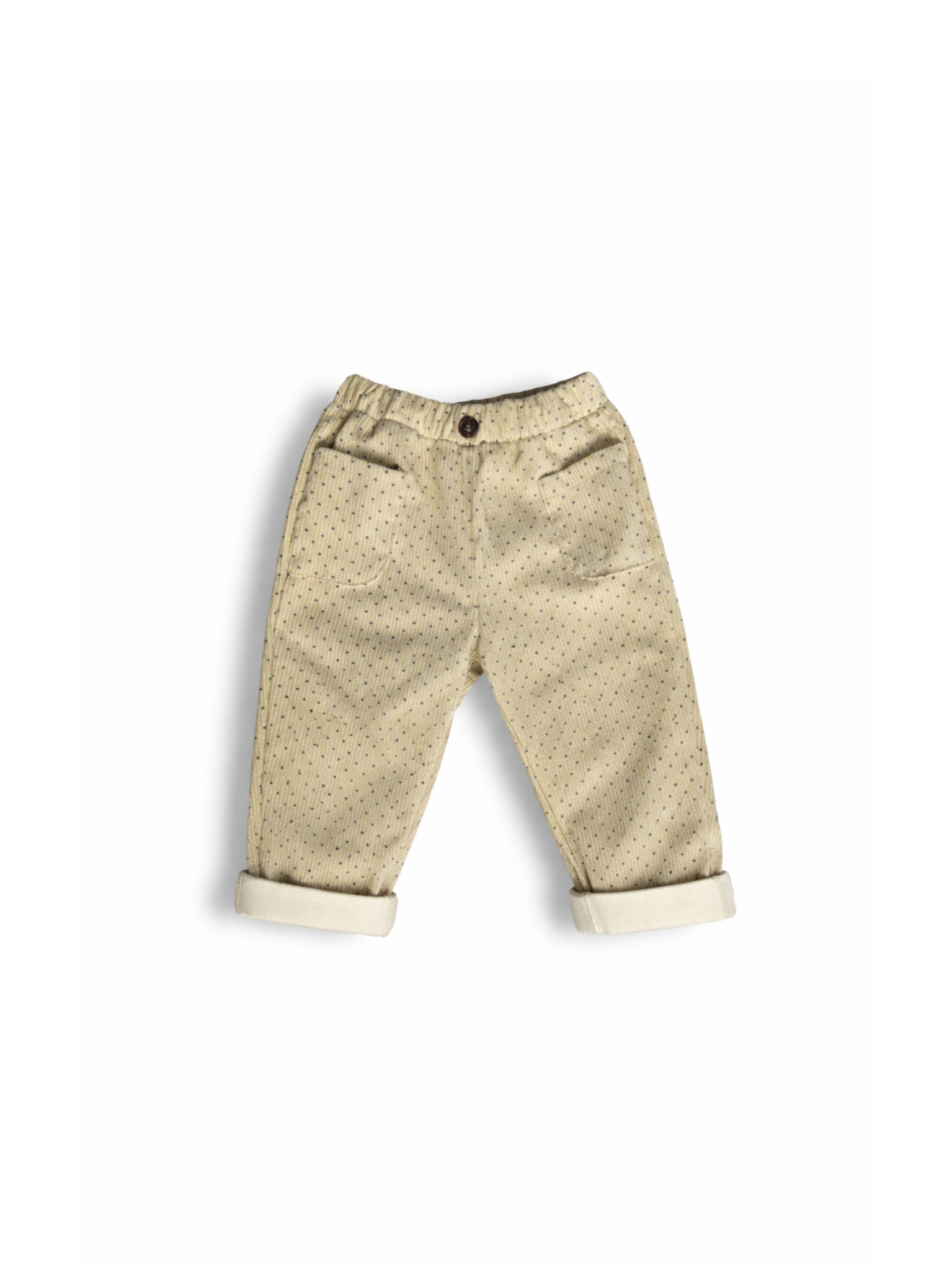 Light cream colored soft polka dot corduroy pants with button. 