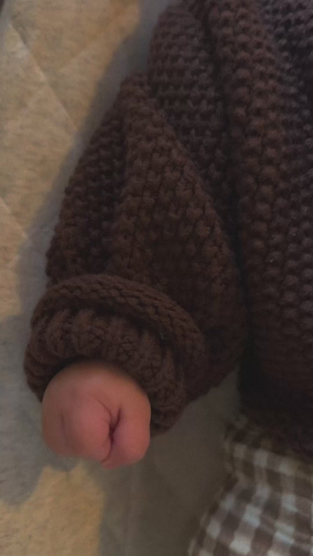 Video of brown thick, cotton polyester blend turtleneck shown on baby. 
